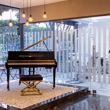 Luxurious piano area at Turkey Teeth Dental Clinic.